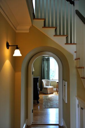 This is EXACTLY what I want to do at the end of the hallway. Add a little arched doorway under the stairs that leads into the back bedroom. It's perfect. Doorway Under Staircase, Archway Under Stairs, Stairs Over Doorway, Doorway Under Stairs, Arch Under Stairs, Door Under The Stairs, Door Under Staircase, Hallway Under Stairs, Bedroom Under The Stairs