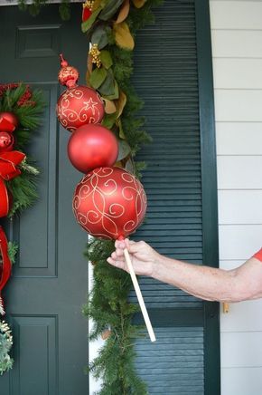 Christmas Ornament Topiary Christmas Ornament Topiary, Ornament Topiary, Decoration On A Budget, Christmas Exterior, Christmas Urns, Christmas Decor Idea, Christmas Topiary, Christmas Garden Decorations, Christmas Wreaths Diy Easy