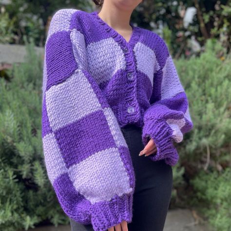 This chunky cardigan is knitted with dark and light purple with chunky wool yarn to keep you warm and cozy. Shopify Balance, Purple Cardigan Outfits, Checkerboard Sweater, Crochet Patchwork Blanket, Patchwork Knitting, Crochet Cardigan Tutorial, Crochet Sweater Design, Crochet Sweater Dress, Hand Knitting Diy