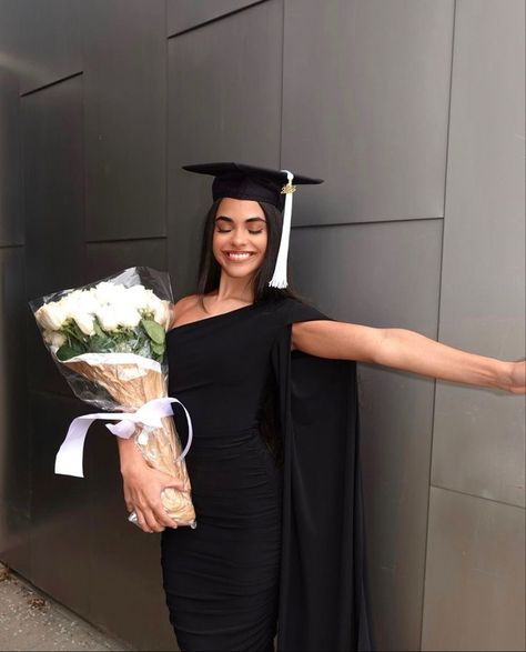 Graduation Cap, A Woman, Flowers, Wall