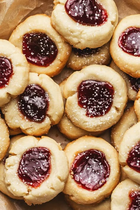 Thumbprint Cookies are a classic festive cookie with a buttery, shortbread cookie base and topped off with all your favorite flavors of jam! Kiss Thumbprint Cookies, Shortbread Jam Cookies, Best Thumbprint Cookies, Fall Desserts Thanksgiving, Christmas Baking Easy, Christmas Shortbread, Thumbprint Cookies Recipe, Cookie Base, Christmas Recipes Easy