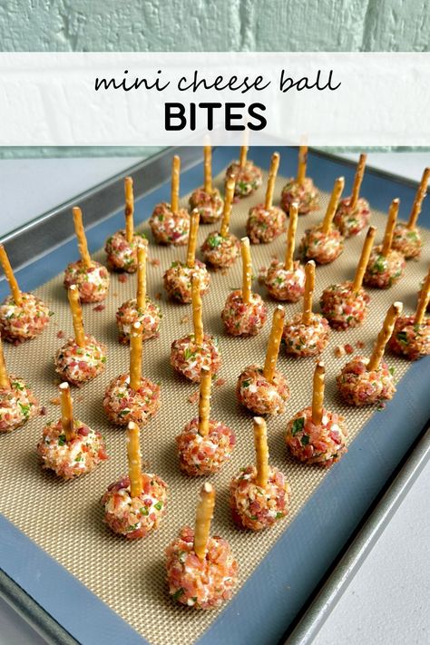 My bacon ranch mini cheese ball bites take an already easy party appetizer to the next level! These little bites are creamy, easy to customize, and are as much fun to make as they are to eat! The prep work only takes about 15 minutes! That’s what I like to call an easy party appetizer!  Whether you’re serving my bacon ranch cheese ball bites as a game day snack, or a Christmas appetizer, these little bites will keep your guests coming back for more! Mini Bacon Ranch Cheese Ball Bites, Bacon Cheeseball Bites, Bacon Ranch Cheeseball Bites, Bear Themed Appetizers, Nye Small Bites, Mini Bacon Ranch Cheese Balls, Cheeseball Bites Pretzel Sticks, Mini Cheese Balls Appetizers, Cheese Ball Appetizers Mini