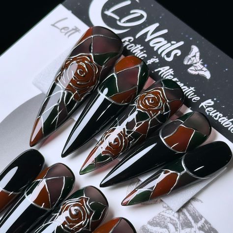 These stained glass beauties are like tiny cathedrals for your fingertips, ready to color your world gothic chic! 🥀✨ Stained Glass Roses: Manicure Roulette Draw, Victorian Gothic Deck, Level 2 Hand-painted, On 2XL Stiletto 💅🏻 ⁣ .⁣ .⁣ .⁣ .⁣ .⁣ #cathedralnails #rosenails #gothnails #gothaesthetic #gothicnails #stainedglassnails #gothstyle #stainedglassart #freestylenails #gothicstyle #pressonnailset #nailartist #stainedglass #stilettonails #gothicbeauty #gothicfashion #stainedglassroses #gothn... Stained Glass Roses, Glass Roses, Gothic Chic, Gothic Nails, Goth Nails, Gel Press, Rose Nails, Glass Nails, Alternative Style