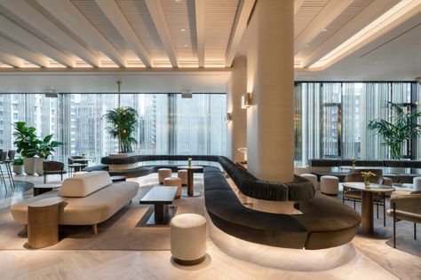 Zebulon Perron designs "sensual" areas at Montreal's Four Seasons hotel White Terrazzo Floor, Curved Banquette, Brown Leather Chairs, Index Design, Herringbone Wood Floor, Terrazzo Floors, Glass Building, Vip Lounge, Hotel Lounge