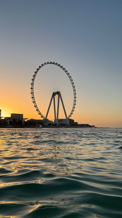 A big wheel on the public beach in Dubai Late Night Flight, Dubai Photo Ideas, Airpod Maxes, Dreams Photo, On Airplane, Dubai Trip, Dubai Beach, Dubai Cars, Dubai Lifestyle