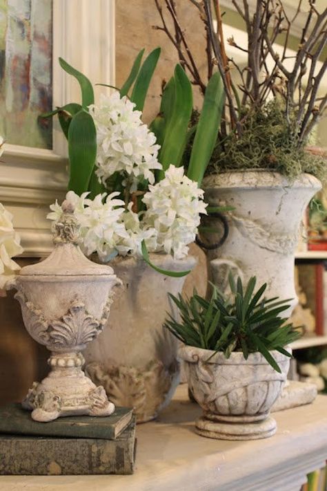 Welcome spring into your home with these spring mantle decor ideas. From farmhouse spring mantels to rustic spring decorating ideas for the mantel, there are plenty of easter mantel ideas to choose from. French Country Mantle, Easter Mantle Decor, Easter Mantel, Spring Mantle Decor, Cloche Ideas, Easter Mantle, White Urn, Spring Mantle, Spring Mantel