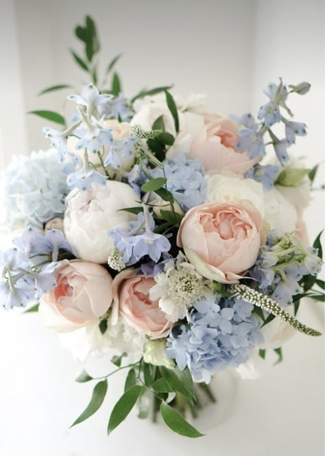 Pink Peonies And Blue Hydrangeas, Pink Blue White Flower Arrangement, Peonies Hydrangea Roses Bouquet, Wedding Colours September, Wedding Flower Arrangements Pastel, Ice Blue Flower Bouquet, Blue Hydrangea Pink Roses, Dusty Blue And Pink Wedding Bouquet, Peach And Blue Wedding Centerpieces