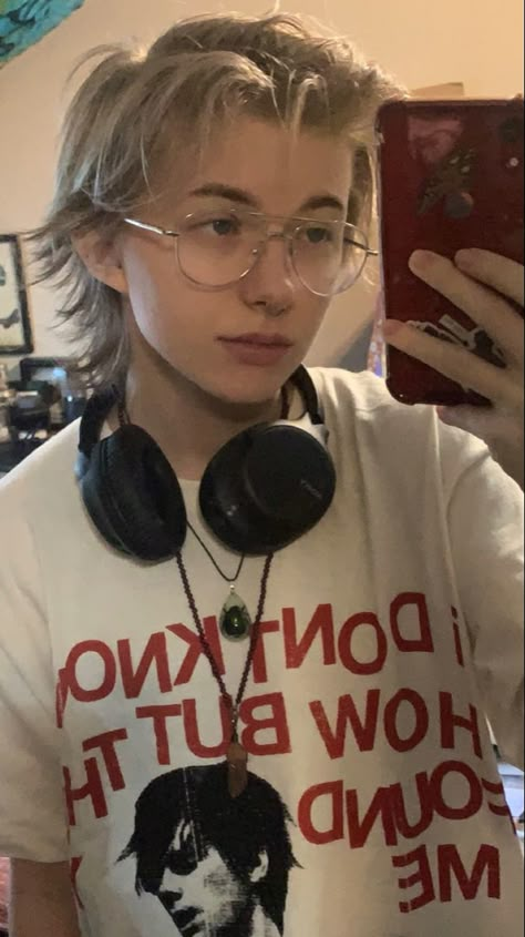 a mirror selfie of an androgynous person with short blond hair, with headphones around their neck and a shirt for the band “i don’t know how but they found me.” Short Hair Ideas Nonbinary, Short Straight Hair Transmasc, Haircut With Glasses Short, Cool Masc Haircuts, Short Hairstyles Transmasc, Transmasc Haircut Mullet, Hair Cuts No Styling, Adrogonus Hair Long, Very Short Mullet Straight Hair