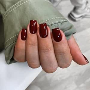 this product is a 24-piece set of wine red press-on nails with a short to medium square shape. They can be applied with adhesive or pressed on and are suitable for the fall and winter seasons. They are reusable and intended for women who desire a stylish and convenient manicure option. Short Coffin Acrylic Nails, Nails Short Medium, Dark Color Nails, Square Gel Nails, Coffin Acrylic Nails, Red Gel Nails, Dark Red Nails, Wine Nails, Maroon Nails