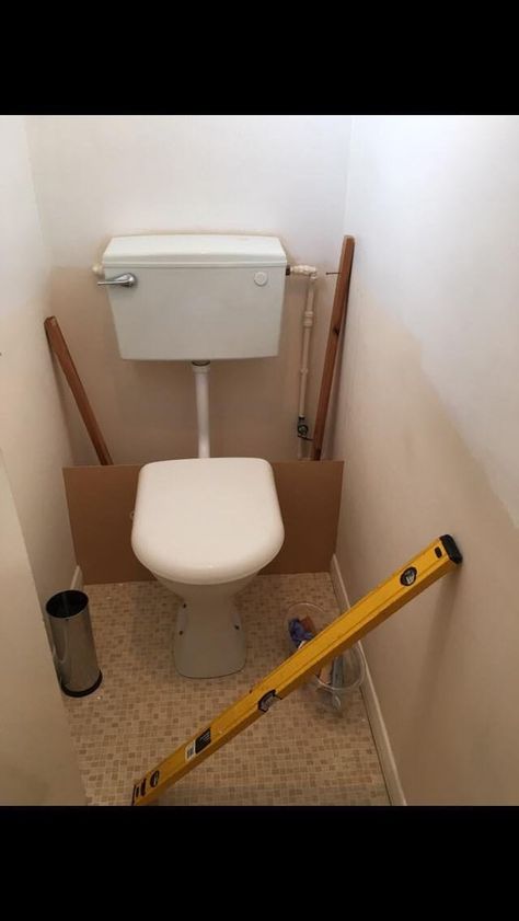 Woman upgrades toilet for just £100 and here's how Cloakroom Toilet Downstairs Loo, Small Toilet Decor, Toilet Remodel, Diy Kast, Small Toilet Design, Wc Ideas, Toilet Closet, Hidden Toilet, Small Downstairs Toilet