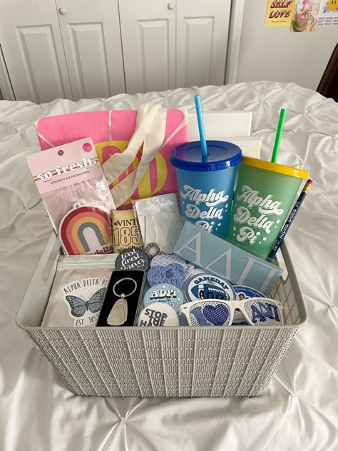 big little basket ideas adpi gifts sorority canvas Sorority Goodie Bags Gift Ideas, College Bday Gifts, Big And Lil Gift Ideas, Sorority New Member Gifts Bid Day, Big/ Little Gifts, Bid Day Baskets Gift Ideas, Basket Ideas Sorority, Big Sis Little Sis Gifts Sports, Sorority Initiation Basket