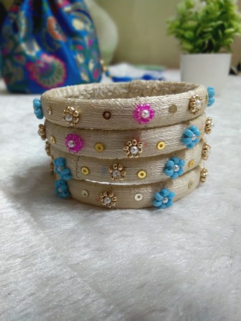 https://youtu.be/hj-axL2znHA Handmade Bangles Ideas, Embroidered Bangles, Bangles Ideas, Diy Bangles, Fancy Bangles, Embroidery Jewellery, Diy Jewellery Making, Silk Thread Bangles Design, Hand Embroidered Jewelry