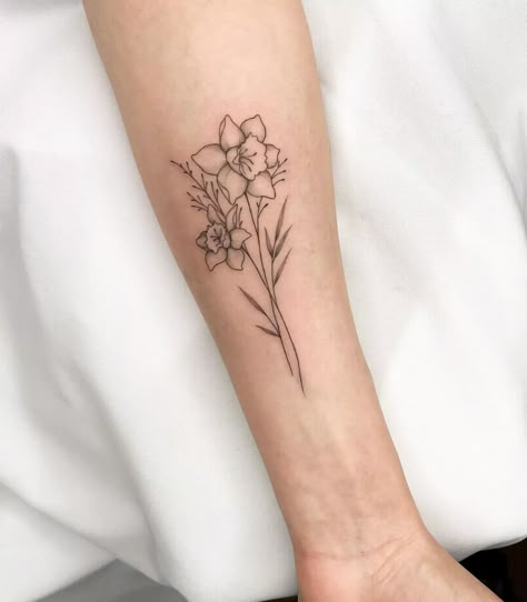 Daffodil Wrist Tattoos For Women, Dafodill Flowers Tattoo Design, Bunch Of Daffodils Tattoo, Daffodil Tattoo Linework, Daffodil Birth Flower Tattoo, Daffodil Collar Bone Tattoo, Rose Carnation Daffodil Tattoo, Daffodil Jonquil Tattoo, Daddodil Flower Tattoo