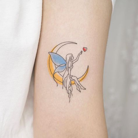 26+ Romantic Moon Tattoo Ideas That Will Give You Ink Envy | Moon Tattoos Check out these glowing moon tattoo ideas for your own ink inspiration. Lifestyle Fairy On The Moon Tattoo, Dancing Fairies Tattoo, Color Fairy Tattoo, Fairy And Moon Tattoo, Fairy Moon Tattoo, Moon Fairy Tattoo, Whimsy Tattoo, Faerie Tattoo, Moon Tattoo Ideas