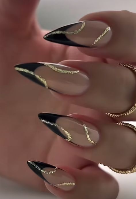 Black And Gold Acrylic Nails Almond, Farewell Nail Ideas, Elegant Nail Designs Black, New Years Nail Ideas Black And Gold, Farewell Nails Ideas, Gold And Black Ombre Nails, Nye Nail Ideas Black And Gold, Black Gold Gel Nails, Black And Gold French Tip Nails Almond