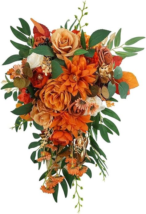 Size: 17.72 inches high, 11 inches in diameter. Materials: made of burnt orange peonies, cream roses, burgundy roses,terracotta roses, green leaves, orange daisy, brown eucalyptus and ribbons. These fake flowers and fake greens are handmade with bright colors, elegant shapes and realistic appearance. They will not wither in a short time during the wedding like real flowers, and will not fade, can stay beautiful forever. Hanging Bridal Bouquet, Bride Bouquets Fall, Orange And Green Bouquet, Wedding Bouquets Orange, Terracotta Roses, Burnt Orange Bridal Bouquet, Brown Eucalyptus, Burnt Orange Flowers, Orange Peonies