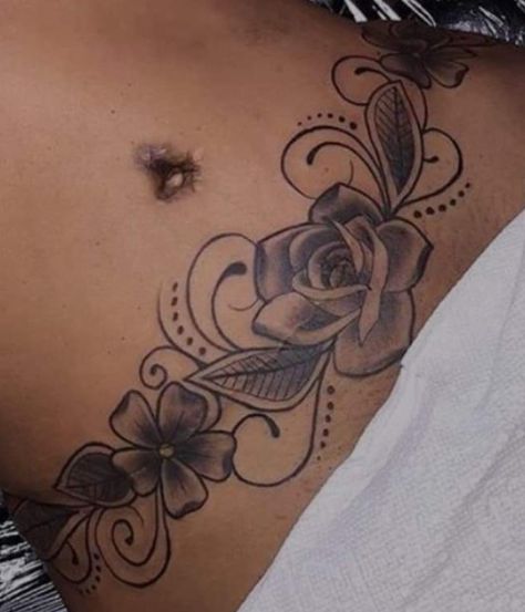 Cute Belly Tattoos For Women, Tattoo Across Stomach, Mommy Makeover Tattoo Cover Up, Tummy Tucks Tattoo Cover Up Black Women, Low Abdomen Tattoo Women, Low Belly Tattoo, Full Buttcheek Tattoo Women, Abdomen Tattoos Women, Cute Belly Tattoos