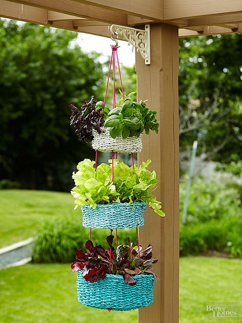 Since we all crave different flavors daily, give yourself room to grow lots of summer herbs. A tiered planter like this DIY hanging basket can be re-created by stringing together multiple woven containers wtih colorful cording. Hang outside your kitchen window or on your porch so you can snip off the sprigs you want and leave the rest for another summertime supper. Summer Herbs, Diy Garden Decor Projects, Diy Frühling, Balkon Decor, Tiered Planter, Summer Diy Projects, Vertical Gardens, Plant Basket, Plant Wallpaper