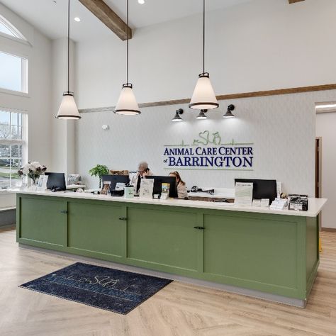 Lobby and reception of an animal hospital. The waiting room is also visible Vet Clinic Design Interiors, Vet Clinic Waiting Room, Vet Clinic Lobby, Veterinary Clinic Design Receptions, Clinic Lobby, Vet Reception, Animal Hospital Design, Vet Clinic Design, Sleek Interior Design