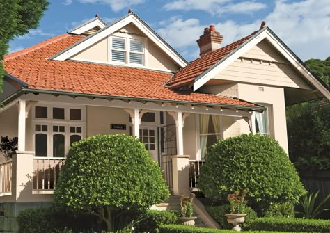 Work with the natural colours and textures of your home to create a colour scheme, like the natural terracotta roof of this house. #taubmanscolour #exterior #naturalmaterials #cafe #teague Terracotta Roof Colour Scheme, Terracotta Roof House, Exterior Colour Schemes, Exterior House Colours, American Bungalow, Red Roof House, Terracotta Roof Tiles, Exterior House Renovation, House Colour