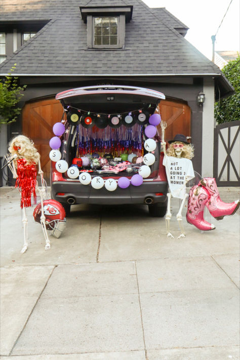 Are you ready for it?! Our Trunk or Treat this year is Taylors Version! 
 🎤🎤🎤
Our Taylor Swift inspired Trunk or Treat is ready to HAUNT IT! Packed full of Era’s inspired décor, album pumpkins, skeletons in tour inspired outfits, butterfly lights, disco balls, and a jumbo friendship bracelet garland declaring we are in our spooky era!


📸: @fernandmaplestyle

#trunkortreat #Taylor #travis #halloween #taylorswift #swiftie #swiftiehalloween Trunk Or Treat Girly, Cute Trunk Or Treat Themes, Trunk Or Treat Ideas Taylor Swift, Cheer Trunk Or Treat Ideas, Taylor Swift Eras Trunk Or Treat, Swiftie Trunk Or Treat, Eras Tour Trunk Or Treat, Trunk Or Treat Ideas For Cars Taylor Swift, Trunk Or Treat Taylor Swift