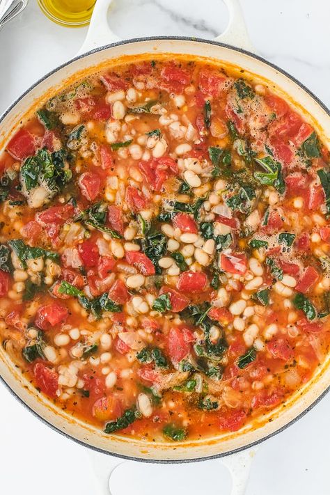 These Quick White Beans with Tomatoes & Kale are simple, delicious and comforting. Using canned beans makes this recipe easy and quick to cook for dinner. Roasted Tomatoes And White Bean Stew, Tomato And Kale Recipes, Tomato White Bean Kale Soup, White Beans And Tomatoes Recipes, Tomato Kale Soup, White Beans In Tomato Sauce, Kale Tomato Recipes, Cannellini Beans And Tomatoes, Kale And Tomato Recipes