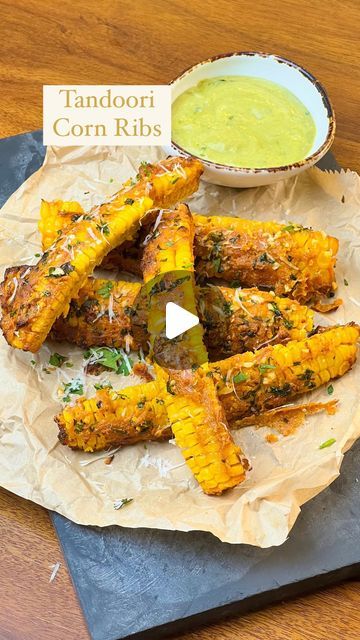 Guntas Sethi on Instagram: "✨Tandoori Corn Ribs✨

This weather calls for a तक तानानाना tandoori corn ribs 🤪🌽

A flavour explosion in every bite Air Fryer Tandoori Corn Ribs - seasoned to perfection, paired with lip smacking dip 🤤

Recipe: 

For the tandoori marinade: 

-2 tbsp mustard oil
-2 tbsp red chilli powder
-1/2 tsp cumin powder
-1/2 tsp Coriander seed powder
-1/4 tsp Turmeric powder
-1 tsp chaat masala
-1/4 tsp garam masala
-1/2 tsp black salt
-1 green chilli
-2 tbsp hung curd 
-2 tbsp roasted besan
-Salt to taste

For the Dip:

-1 tbsp mint-coriander chutney
-1 tsp chaat masala 
-3 tbsp mayonnaise 

🌽 Air-fry the corn ribs at 180*C for 15 mins 

#tandooricornribs #cornribs #cornrecipes #sweetcorn #monsoonappetisers #snack #healthiersnack #tandooriflavour #quickrecipes 

[Tando