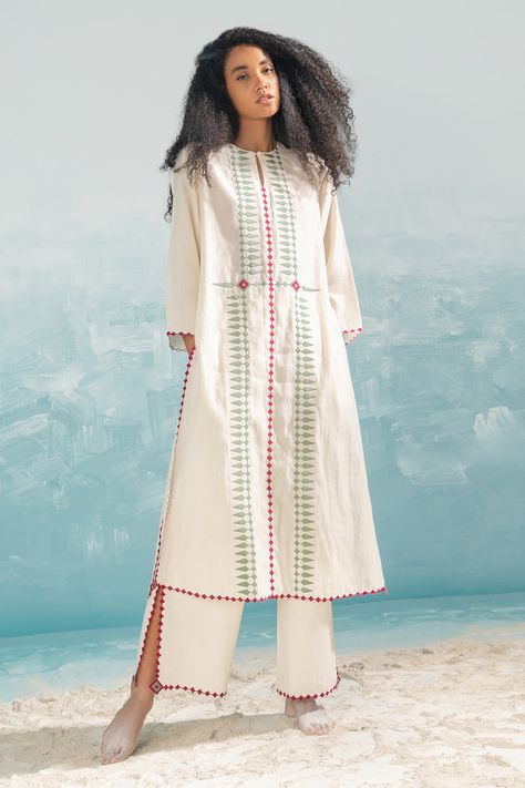 Shop for these amazing collections of Ivory Cotton Silk Chanderi Applique Nile Mild A-line Tribal Tunic For Women by Ikai online at Aza Fashions. Cotton Tunics For Women, Long Kurti Patterns, Tunics Online, Simple Kurta Designs, Tunic Designs, Casual Indian Fashion, Denim Maxi Dress, Cotton Kurti Designs, Modest Dresses Casual