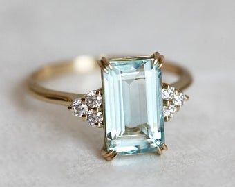 Emerald Cut Aquamarine Ring, Ring Inspo, Aquamarine Engagement Ring, Aquamarine Ring, Dream Engagement Rings, Dream Engagement, Engagement Ring Cuts, Aquamarine Rings, Halo Engagement Rings