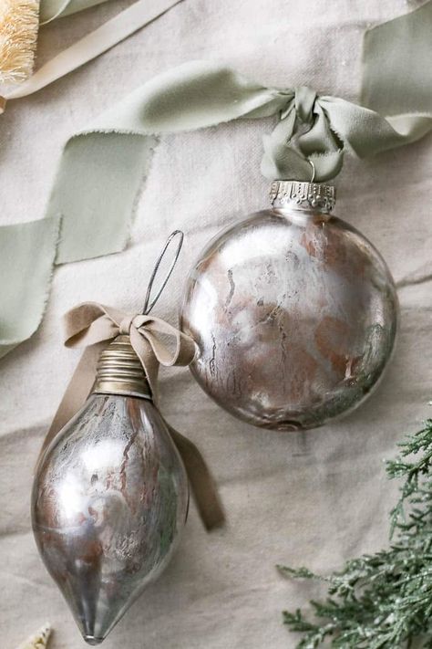 Get ready to impress with these DIY faux mercury glass Christmas ornaments. Your tree will sparkle like never before! Diy Plastic Ornament Ideas, Diy Clear Ornament Ideas, Apartment Decorating Christmas, Diy Mercury Glass Ornaments, French Farmhouse Christmas, Glass Ornaments Diy, French Country Christmas Decor, Green And White Christmas, Country Christmas Decor