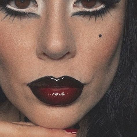 Cristelle ballet on Instagram: "Goth Morticia (or is it drag 🖤) Eyes @armanibeauty eye tint black @makeupbymario master matte palette @maybelline ink pen liner Lips @meltcosmetics black liquid lipstick @sephoracollection 99 cream lip stain @maybelline 20 superstay matte ink Face @hindash for contour blush Highlight is @nyxcosmetics_france" Black Lipliner With Red Lipstick, Vampire Lipstick, Red And Black Lip Combo Matte, Red Lipstick Black Lipliner, Goth Lip Makeup, Red And Black Lipstick Ombre, Goth Lipstick, Black Lipstick Makeup, Halloween Lipstick