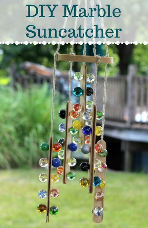 DIY Marble Suncatcher Mobile so easy to make! Diy Marble Crafts, Marble Crafts, Wind Chimes Homemade, Suncatcher Diy, Marbles Crafts, Diy Suncatchers, Crafts For Teens To Make, Diy Marble, Diy Wind Chimes