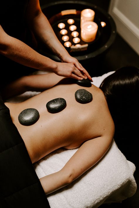 Hot stone massage at Body Sanctum Day Spa in Queenstown, New Zealand. Massage Therapy Photoshoot, Massage Therapist Photoshoot Ideas, Massage Therapist Photoshoot, Massage Photoshoot Ideas, Spa Photoshoot, Massage Therapy Career, Esthetician Spa, Spa Photography, Massage Images