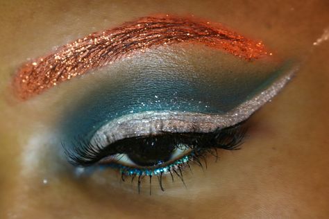 Miami Dolphins Makeup look. Aqua makeup , orange makeup , colored brows , glitter makeup Miami Dolphins Makeup, Dolphin Makeup, Colored Brows, Makeup Orange, Orange Makeup, Glitter Makeup, Miami Dolphins, Travel Journal, Dolphins