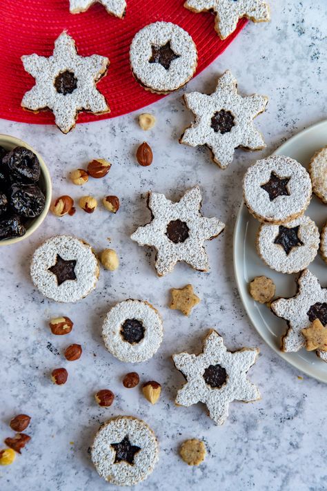 The Hazelnut and Prune Jam Linzer Cookies are a new spin on a classic cookie. Made California prunes, the cookie is a delicious combination of hazelnuts and fresh made prune jam. Cranberry Pistachio Shortbread Cookies, Cranberry Pistachio Shortbread, Prune Jam, Pistachio Shortbread Cookies, Pistachio Shortbread, Prune Recipes, Curd Tart, Lime Curd, Roasted Pineapple