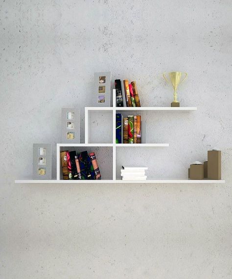 With the increasing digitization of literature, the need for space-consuming bookcases has diminished. It is indeed, not difficult to conceive of a future where Bookshelf Woodworking Plans, Wall Rack Design, Diy Bookshelf Design, Minimalist Bookshelves, Unique Wall Shelves, Small Wall Shelf, Unique Bookshelves, Creative Bookshelves, Minimalist Shelves