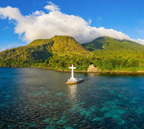 Camiguin Island in the Philippines is a picture-perfect oasis of beaches, foliage, waterfalls, and even a sunken cemetery. Here are our top reasons for visiting this slice of paradise. Sunken Cemetery Camiguin, Camiguin Island, Northern Mindanao, Cambodia Travel, Exotic Places, Remote Island, Philippines Travel, Island Tour, South America Travel