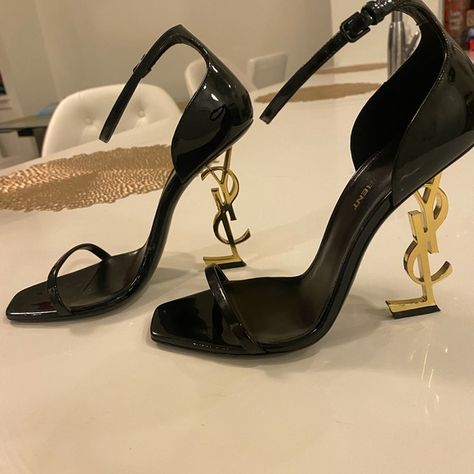 Saint Laurent Black Opyum In Patent Leather with Gold-tone Heel Sandals Ysl High Heels, Yes Saint Laurent, St Laurent, Ysl Shoes Heels, Yves St Laurent, Loubitons Heels, St Laurent Heels, Saint Laurent Shoes Aesthetic, Salto Saint Laurent