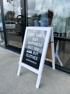 Boutique Outdoor Display, Small Storefront Design, Clothing Display Ideas Boutiques Small Spaces, Clothing Boutique Decor Small Spaces Display Ideas, Sign Quotes Funny, Boutique Sidewalk Signs, Boutique Sidewalk Sign Ideas, Boutique Outdoor Signs Store Fronts, Store Sidewalk Signs