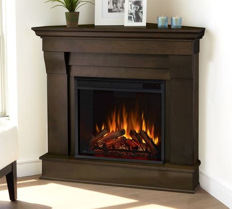 Real Flame® 41" Chateau Corner Electric Fireplace | Pottery Barn Electric Fireplace Mantel, Media Electric Fireplace, Corner Electric Fireplace, Electric Fireplace With Mantel, Stone Mantel, Fireplace Heater, Real Flame, Corner Fireplace, Wood Burning Fires