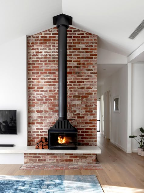 7 Cozy Fireplaces to Keep You Warm All Winter - Cottage Journal Brick Fireplace With Wood Stove, Wood Burning Stoves Living Room, Design Camino, Wood Stove Fireplace, Big Room, Freestanding Fireplace, Edwardian House, Fire Places, Street House