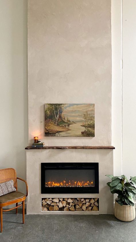 ispydiy on Instagram: I know they say you shouldn’t pick favorites, but this DIY Faux plaster fireplace tops my list! We still have to decorate the living room… Concrete Wash Fireplace, Stone And Stucco Fireplace, Plaster And Brick Fireplace, Diy Faux Plaster Fireplace, Plaster And Stone Fireplace, Plaster Feature Wall, Organic Fireplace Design, Faux Limestone Fireplace, Plaster Gas Fireplace