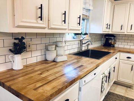 Butcher block counter top with subway tile backsplash Butcher Block Countertops Kitchen, Butcher Block Countertop, White Counters, Farmhouse Kitchen Design, New House - Kitchen, Butcher Block Countertops, Dark Cabinets, Modern Farmhouse Kitchens, Kitchen Redo