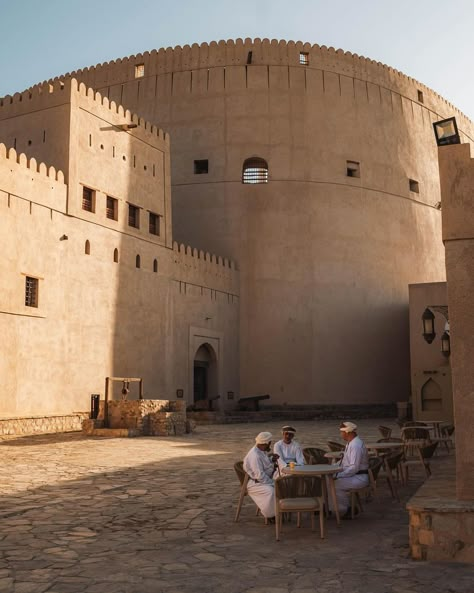 Nizwa is one of Oman’s oldest cities and a labyrinth of tradition 🇴🇲 Immerse yourself in the vibrant maze of Nizwa’s historic district, where the imposing Nizwa Fort presides over a symphony of mudbrick architecture and bustling marketplaces. Surrounded by mountains and rich in culture, Nizwa is a perfect city for those fascinated by the past and diverse cultures. 📸 @awonderseeker #VirtuosoTravel #SoVirtuoso Oman Culture, Nizwa Oman, Journal Cutouts, Travelling Asia, Historic District, Old City, Architectural Digest, Architecture Interior Design, Asia Travel