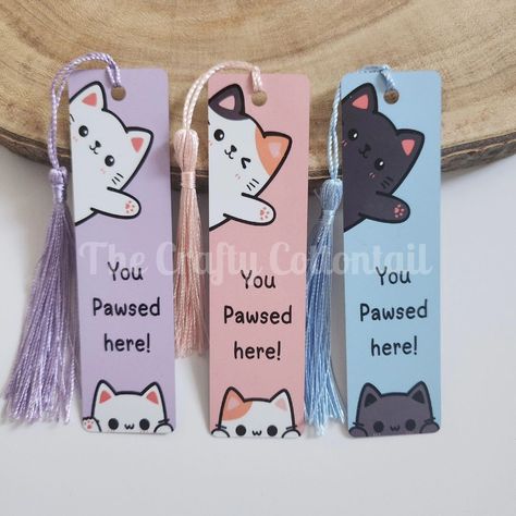 Cute kitty kawaii style bookmarks now available! Which is your favourite? 🐱🐾 #kitty #kawaiiaesthetic #bookish #booktok #cats #catlovers #reading #bookmarks #bookaccessories #calico #whitecat #blackcat Creative Paper Bookmarks, Cat Paw Bookmark, Bookmark Cat Design, Drawing Ideas Bookmark, Cute Cat Bookmarks Diy, Cute Designs For Bookmarks, Book Maker Ideas, Book Lover Painting Ideas, Cute Bookmarks To Make