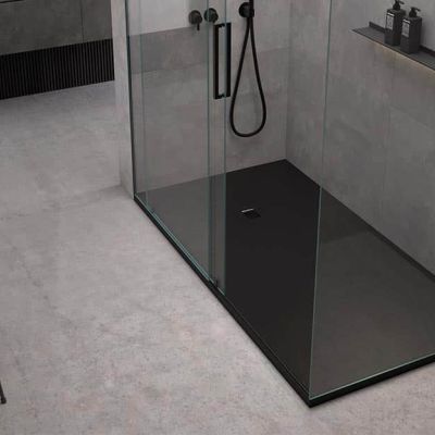 Modern Low Profile Stone Shower Pans & Bases - Innovate Building Solutions Solid Shower Pan, Black Floor Shower Ideas, Low Profile Shower Tray, Dark Shower Pan, Solid Surface Shower Floor, Solid Shower Floor, Shower Pans Ideas, Solid Surface Shower Pan, Black Shower Pan Ideas