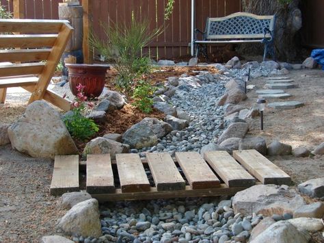 dry creek beds | DIY dry river bed with bridge Creek Bed, Garden Area, Dry Creek, Rain Garden, Budget Backyard, Landscaping With Rocks, Back Garden, Garden Stones, Diy Backyard