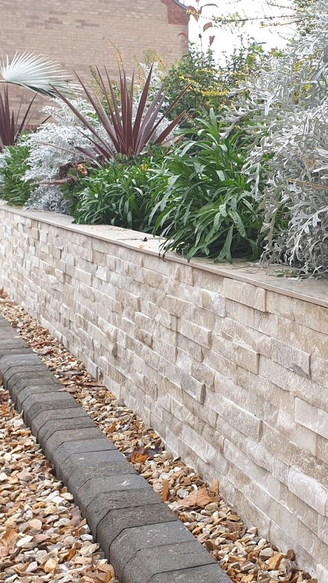 Your garden walls don't have to be boring you know. This picture shows cream textured split face wall tiles used to clad a garden wall. Mosaic Kitchen Tiles, Wildlife Garden Design, Face Mosaic, Stone Walls Garden, Mosaic Kitchen, Natural Stone Mosaic, Outdoor Tile, Garden Walls, Tiered Garden