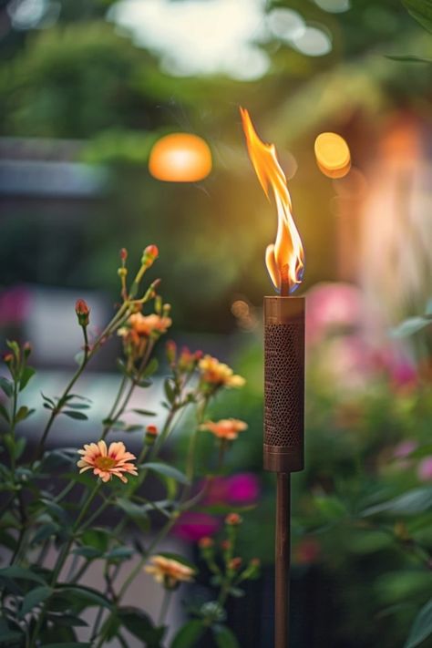 Transform your ordinary backyard into a tropical retreat with these fab tiki torch ideas! Perfect for outdoor evenings, tiki torches create a cozy atmosphere while adding a splash of style. Whether you're hosting a party, hanging with friends, or having a romantic night under the stars, these creative lighting options can set the perfect mood. Explore creative setup tips and other backyard enhancements with tiki torches that reflect your personal style and make your space shine all night long! Backyard Enhancements, Tiki Torch Ideas, Tiki Torches Backyard, Tiki Torches Diy, Torches Diy, Calacatta Tile, Dreamy Backyard, Functional Backyard, Small Urban Garden