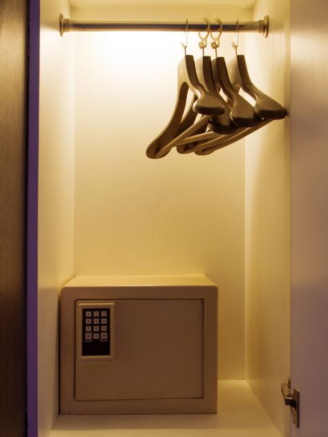 12 Smart Places to Hide a Safe  ||  Keep the whereabouts of your valuables on lock with these secret storage ideas https://www.bobvila.com/slideshow/12-smart-places-to-hide-a-safe-53100?slide_name=12-hidden-safes-that-can-thwart-burglars& Closet Safe Ideas, Secret Storage Ideas, Storage Ideas For Bedrooms, Closet Safe, Safe Ideas, Safe Lockers, Secret Drawer, Small Safe, Secret Hiding Places